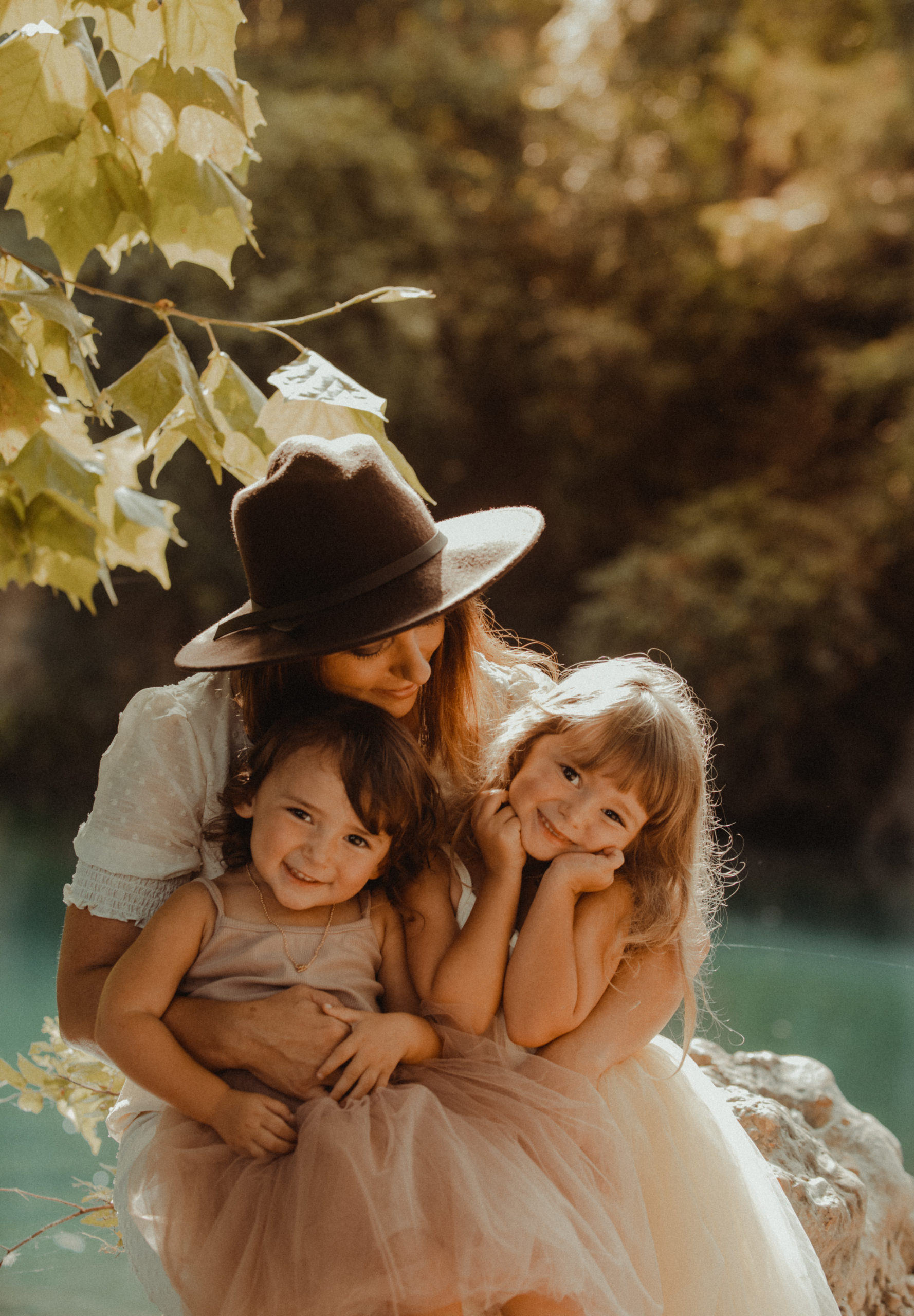 Motherhood photo with mother and two daughters by meredith mccann photography new braunfels texas